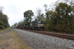 NS 9234 takes an eastbound container train through MP143.5